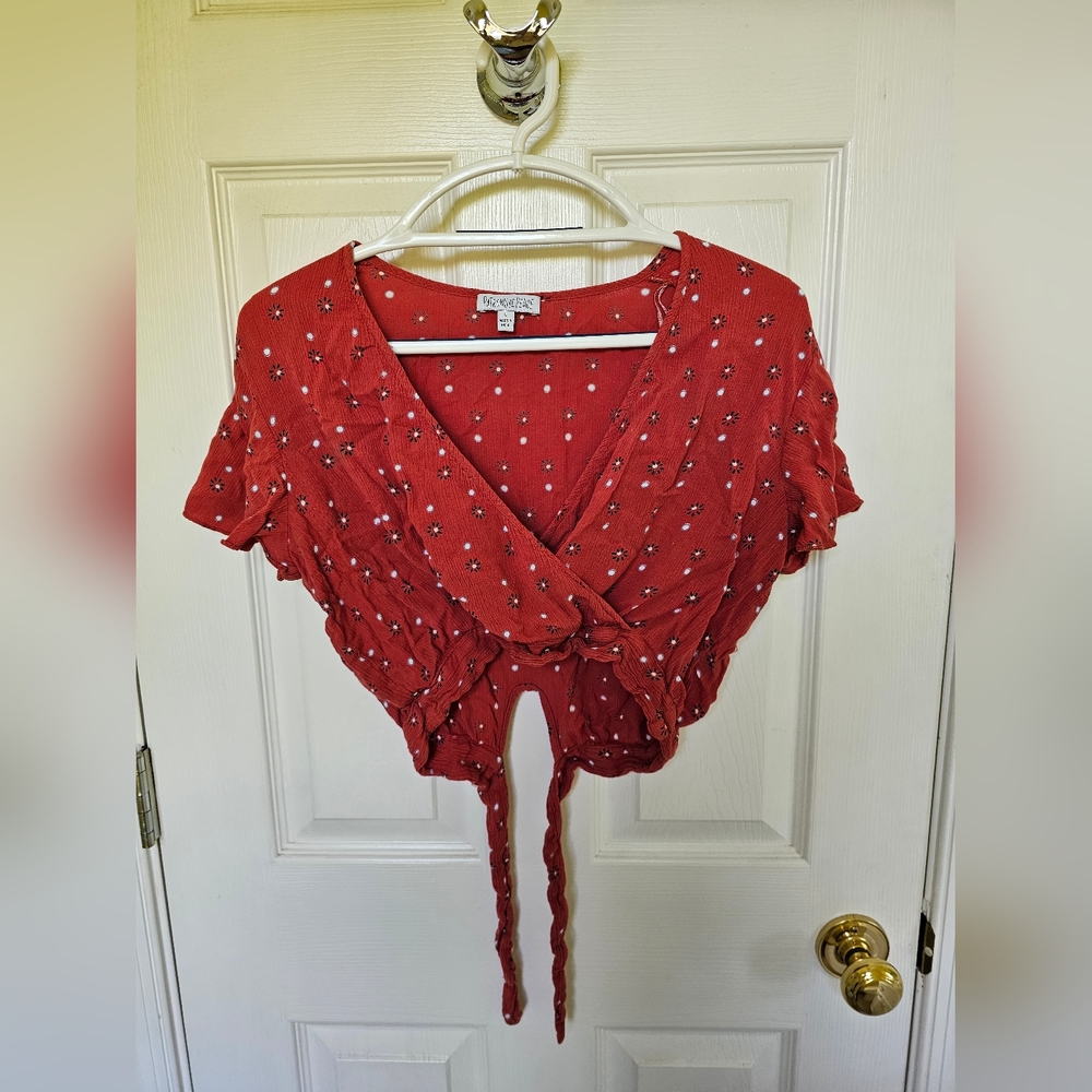 Patrons of Peace size L rust colored wrap style crop top with tie-back